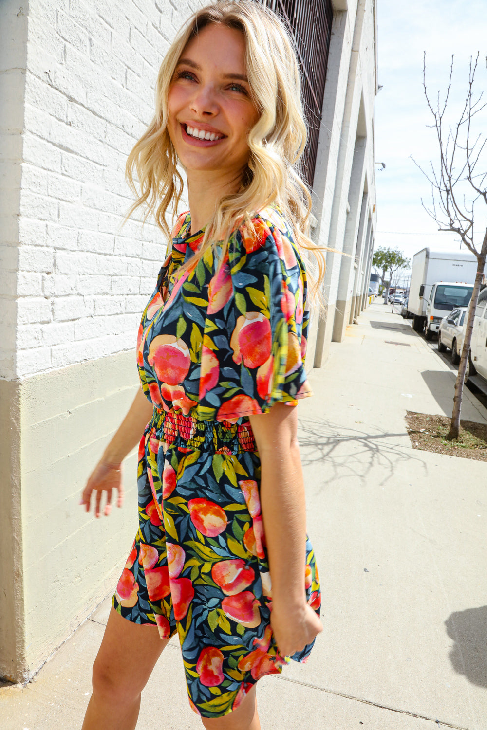 Sunny Days Floral Print Smocked Waist Back Neck Button Romper-Modish Lily, Tecumseh Michigan