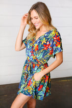 Load image into Gallery viewer, Navy Tropical Floral Surplice Romper-Modish Lily, Tecumseh Michigan
