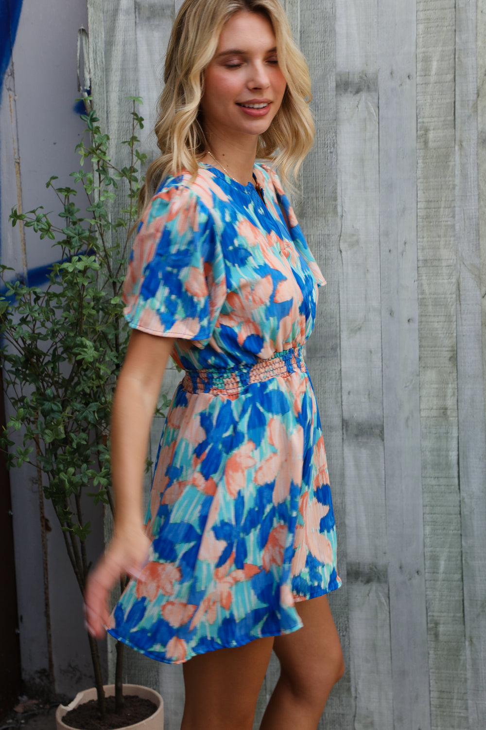Feeling Bold Turquoise Floral Smocked Waist Flutter Sleeve Romper-Modish Lily, Tecumseh Michigan