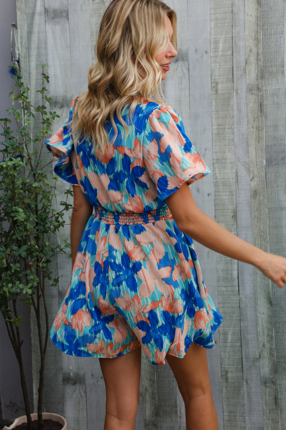 Feeling Bold Turquoise Floral Smocked Waist Flutter Sleeve Romper-Modish Lily, Tecumseh Michigan