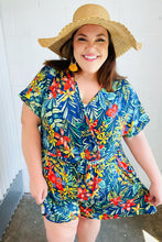 Load image into Gallery viewer, Navy Tropical Floral Surplice Romper-Modish Lily, Tecumseh Michigan
