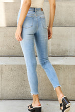 Load image into Gallery viewer, Judy Blue Button Fly Raw Hem Jeans-Modish Lily, Tecumseh Michigan
